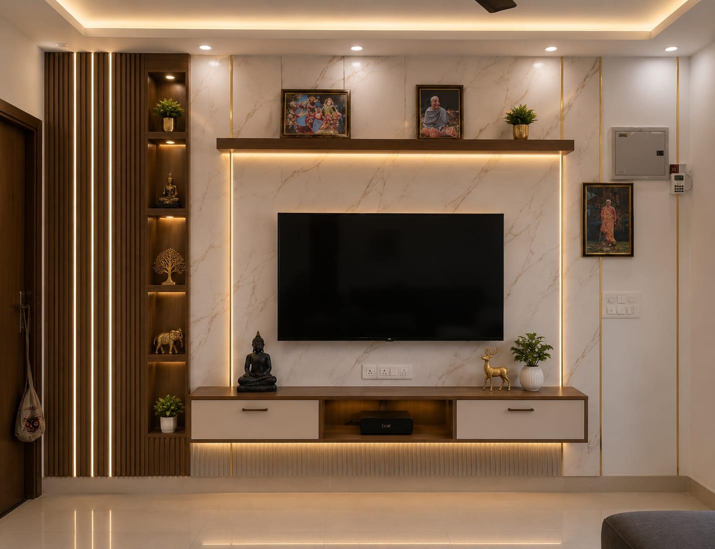 TV unit with marble backdrop and mandir-style display shelving
